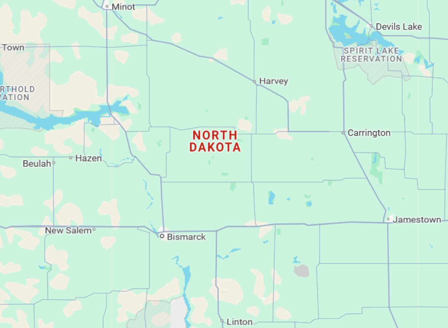 Partial North Dakota map showing cities like Bismarck, Jamestown, Minot, Devils Lake, Carrington, Beulah, Hazen, and Harvey