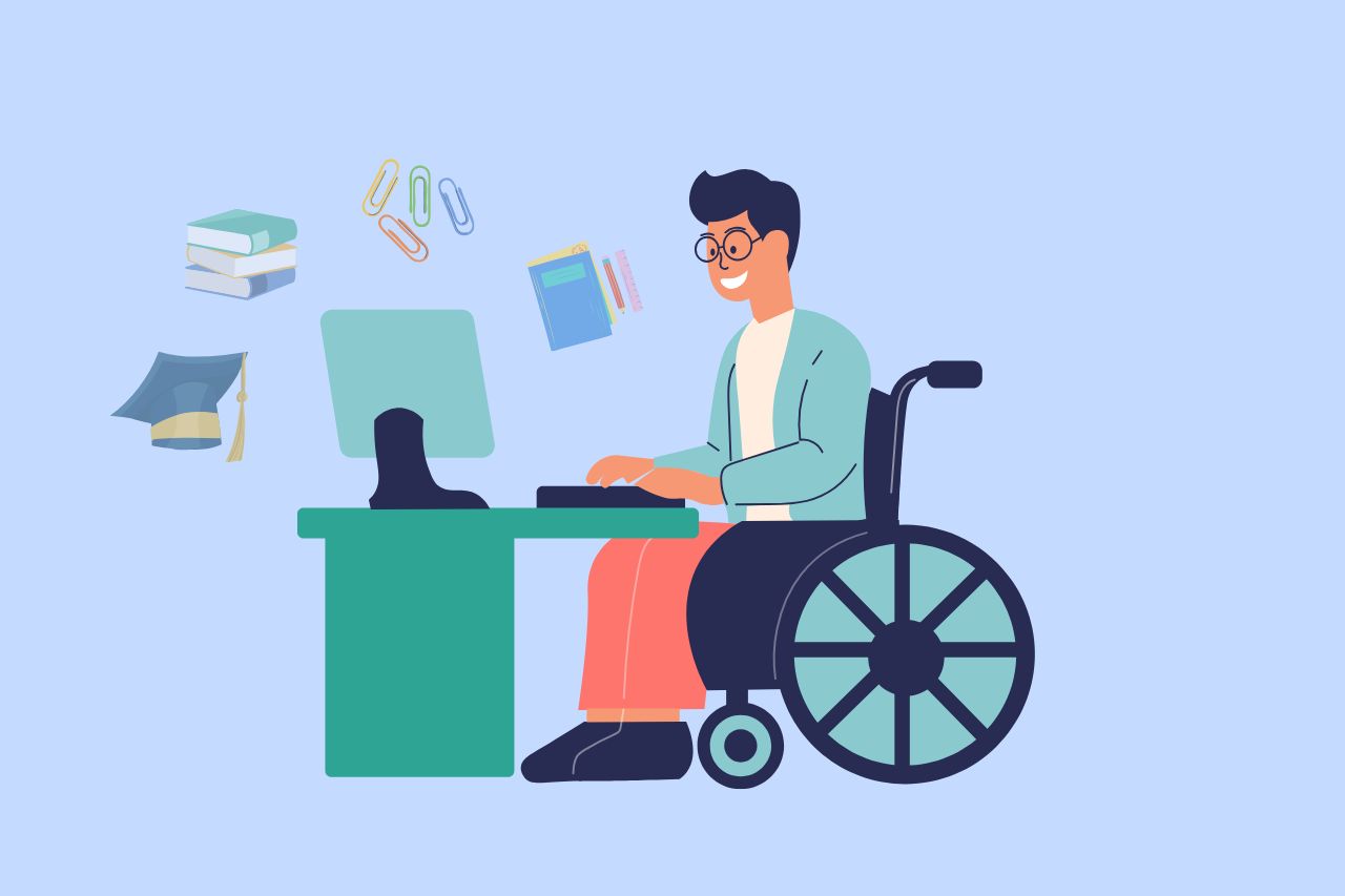 Person in a wheelchair working on a computer